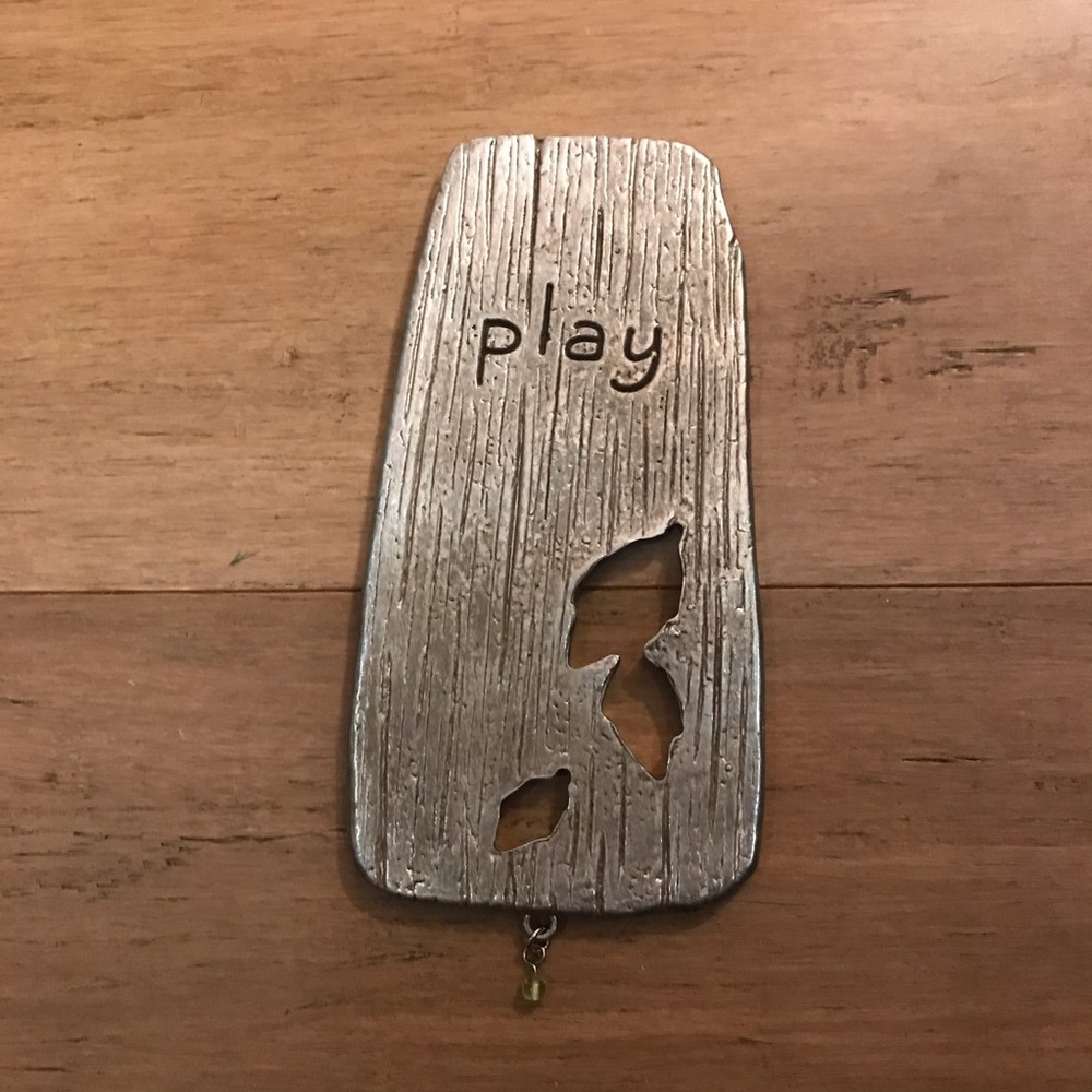 ‘Play’ metal wall embellishment